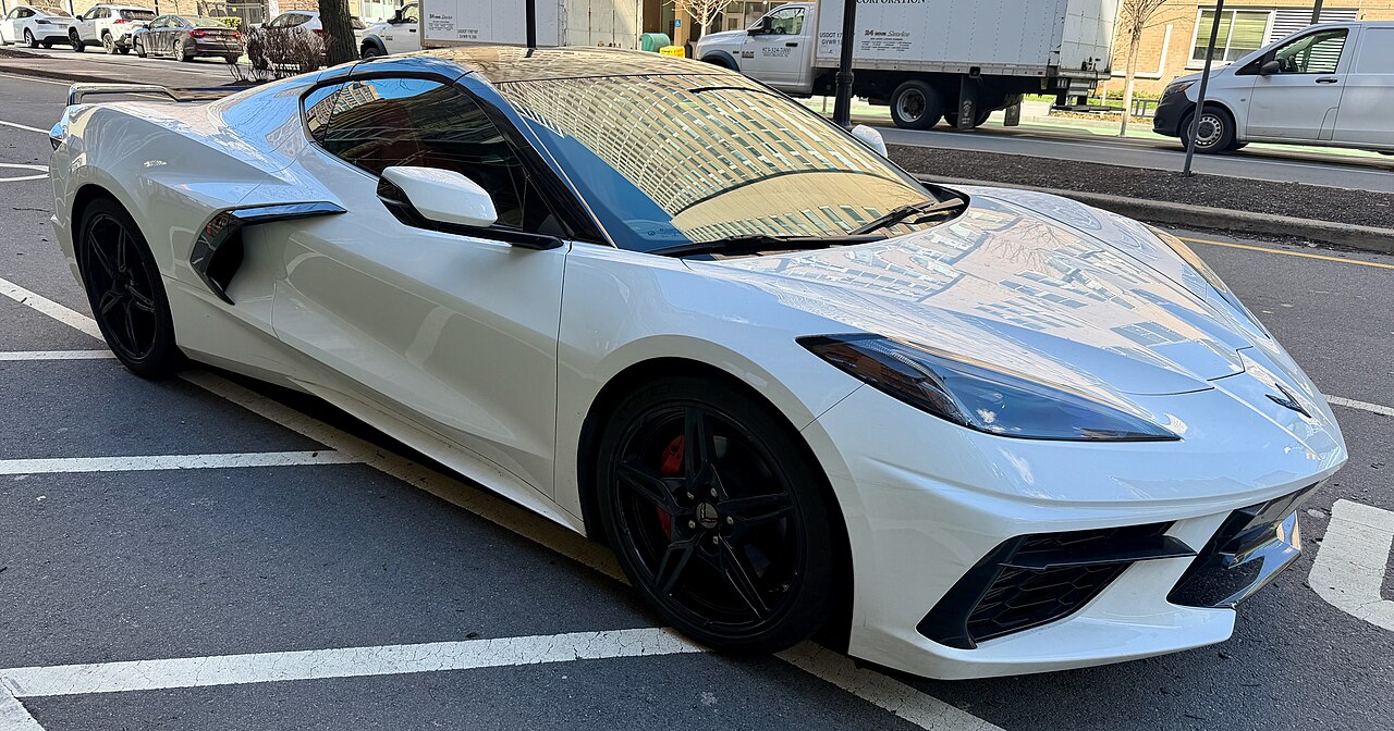 White Chevrolet Corvette C8 Stingray seen from the front corner